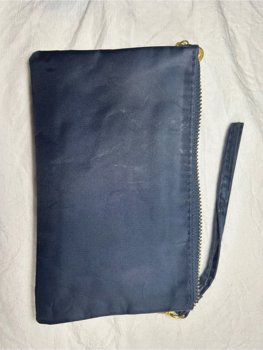 Tory Burch Navy Wristlet with Gold Emblem